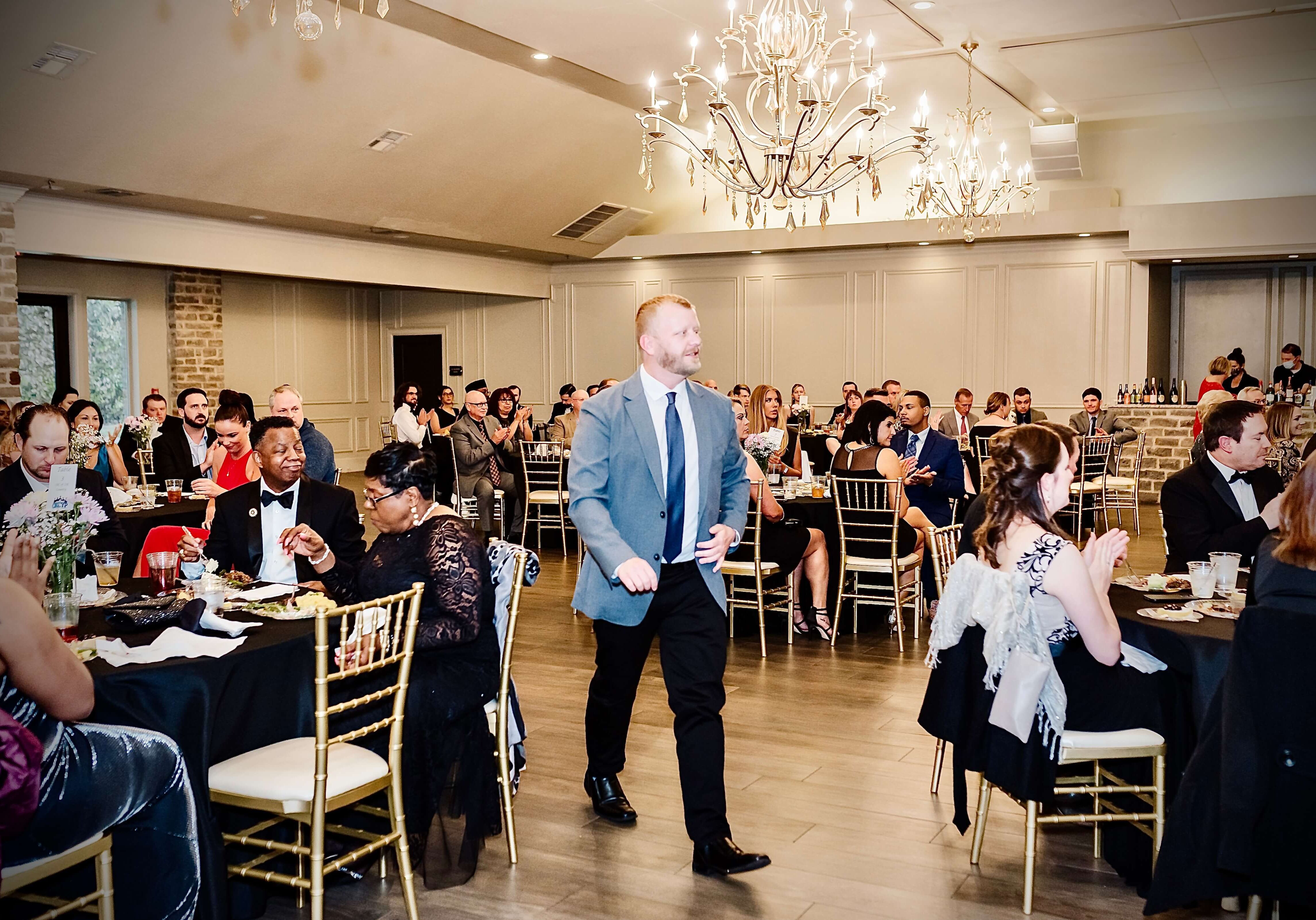 man walking up to speak